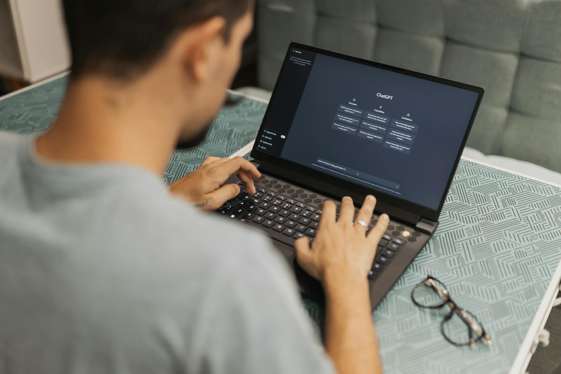 man using laptop wit chat gpt